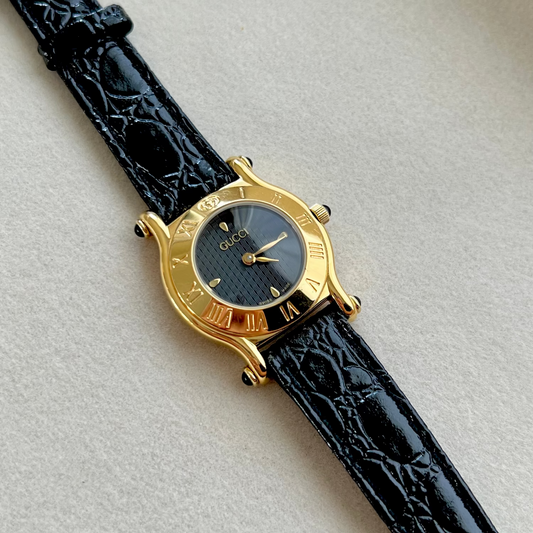 Gucci Gold Toned Ladies Watch with Roman Bezel and Textured Dial, product view 1.