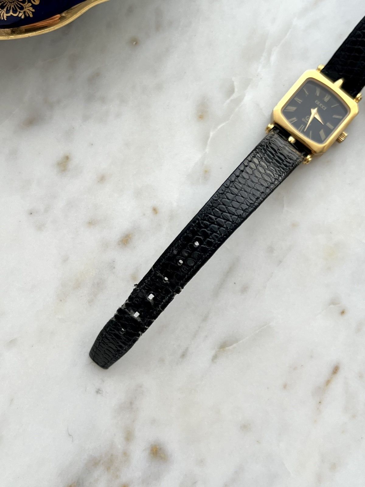 Gucci Sherry square watch black textured leather strap and adjustment holes