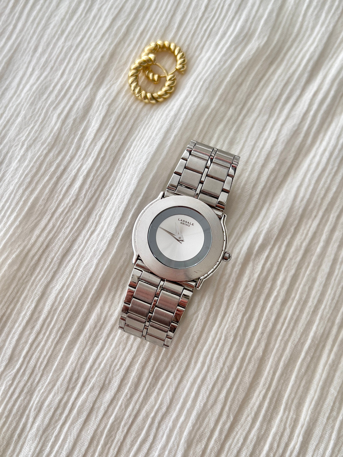 Lassale by Seiko Retrocool Woman's Watch with Unique Diamond Cut Crystal, bracelet detail of a vintage women's watch at Gilded Hour.