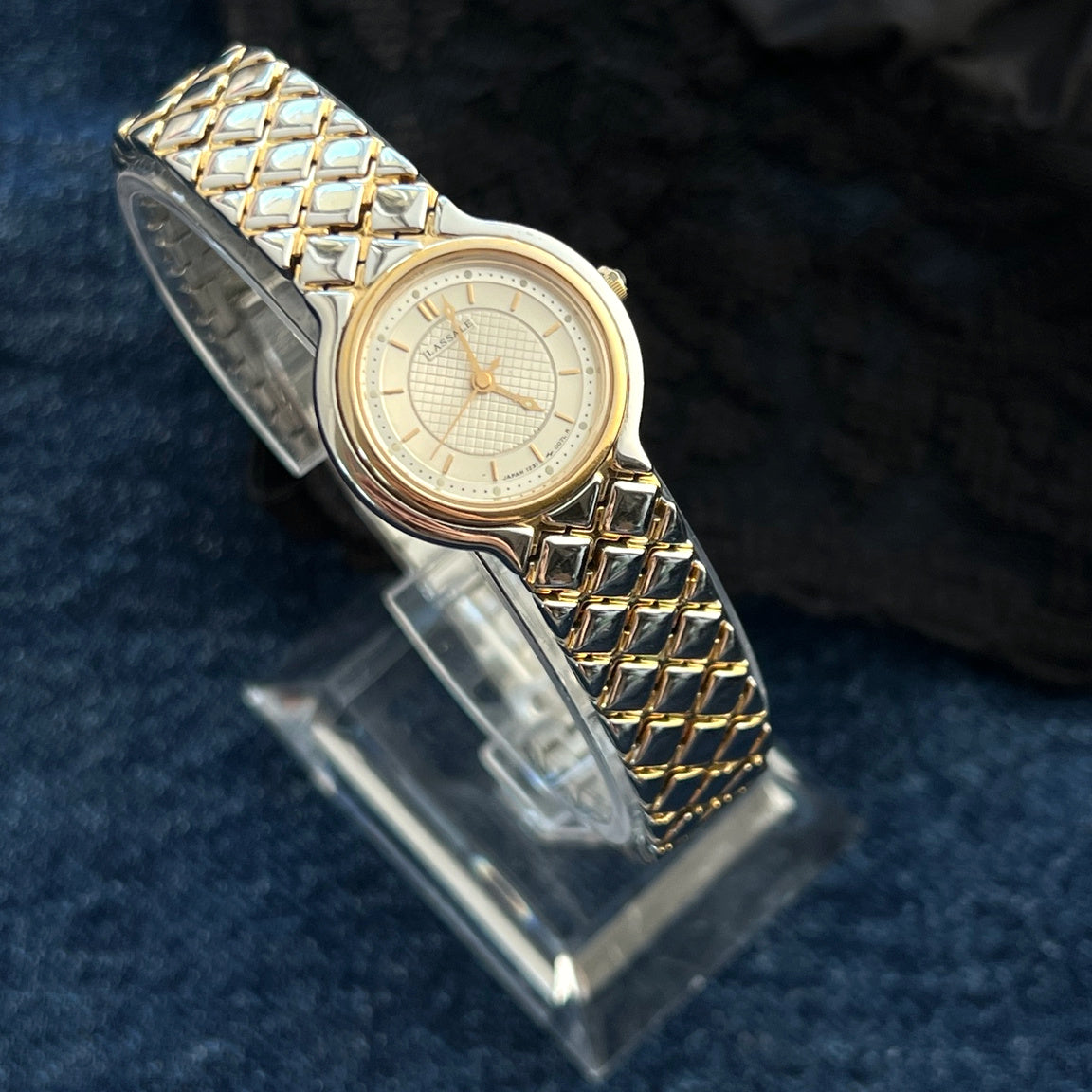 Lassale by Seiko women’s watch showing the lattice dial, gold tone bezel and two tone bracelet