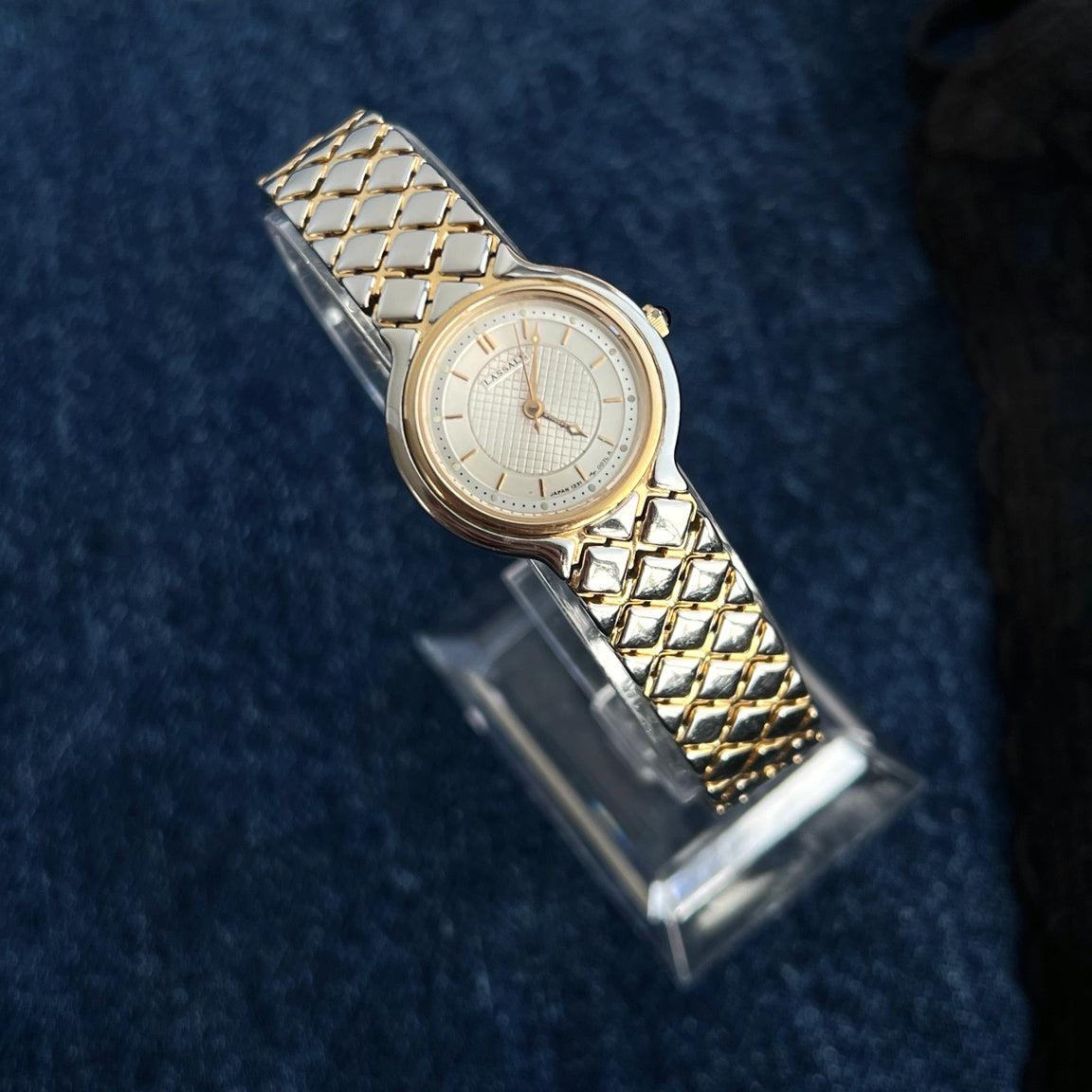 Front view of the Lassale by Seiko lattice dial women’s watch and integrated two tone bracelet