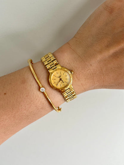 Longines Conquest Gold Petite Bracelet watch — on wrist