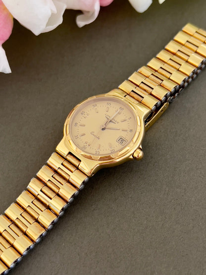 Longines Conquest Gold Women’s Watch with Scalloped Bezel — angled view of scalloped bezel and dial.