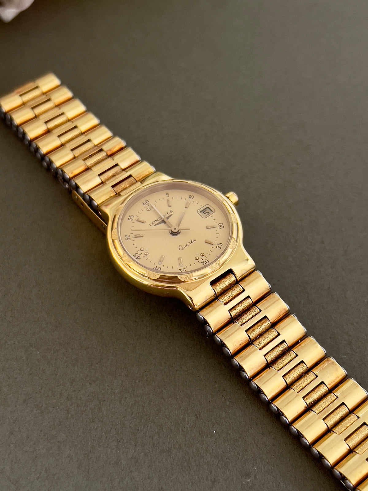 Longines Conquest Gold Women’s Watch with Scalloped Bezel — front view of dial and bracelet.