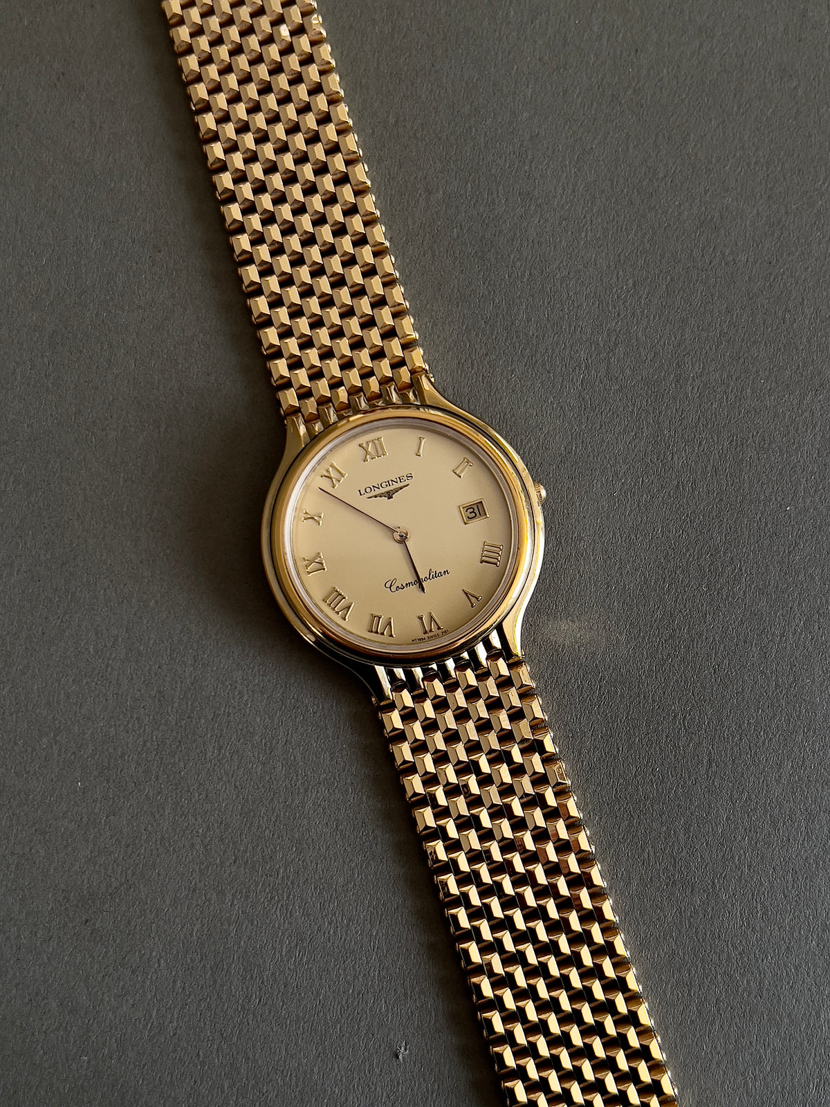 Longines Cosmopolitan Gold Roman Dial Unisex Watch — full bracelet and Roman dial.