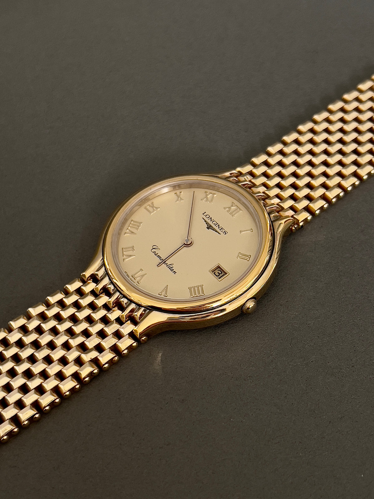 Longines Cosmopolitan Gold Roman Dial Unisex Watch — case profile and bracelet.