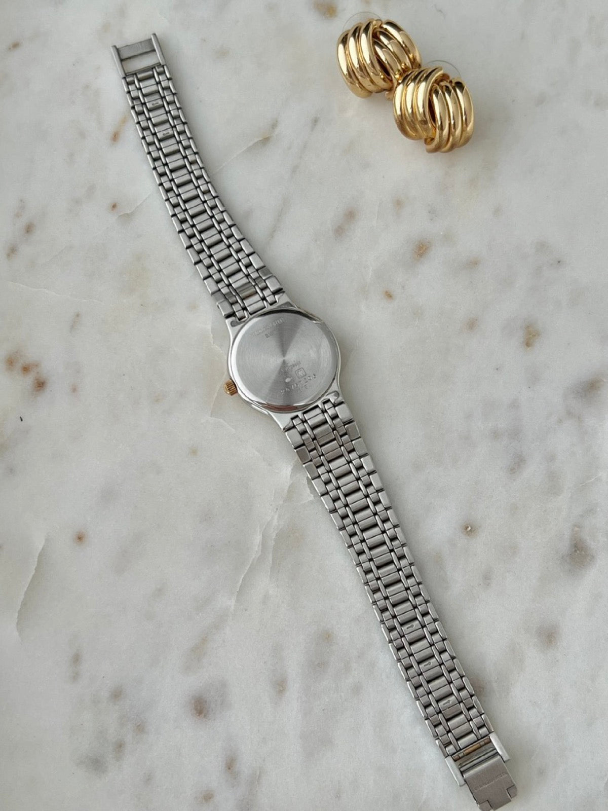Caseback and reverse side of the Longines Flagship two tone bracelet watch