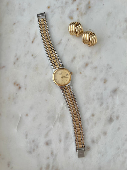 Full length view of the Longines Flagship two tone articulated bracelet and watch head
