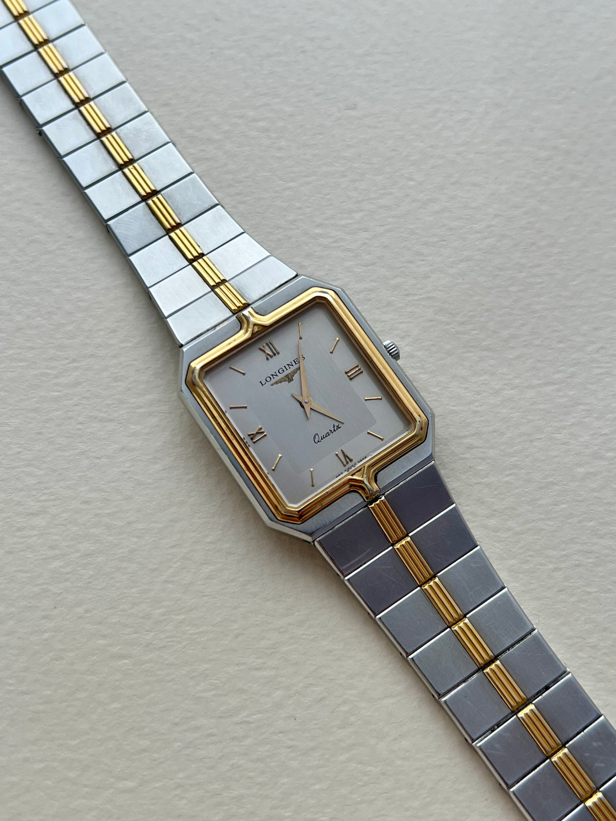 Longines Flagship two-tone rectangular watch, angle.