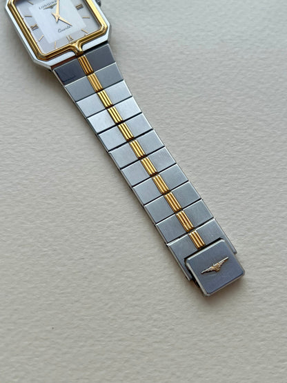 Longines Flagship two-tone rectangular watch, wrist.