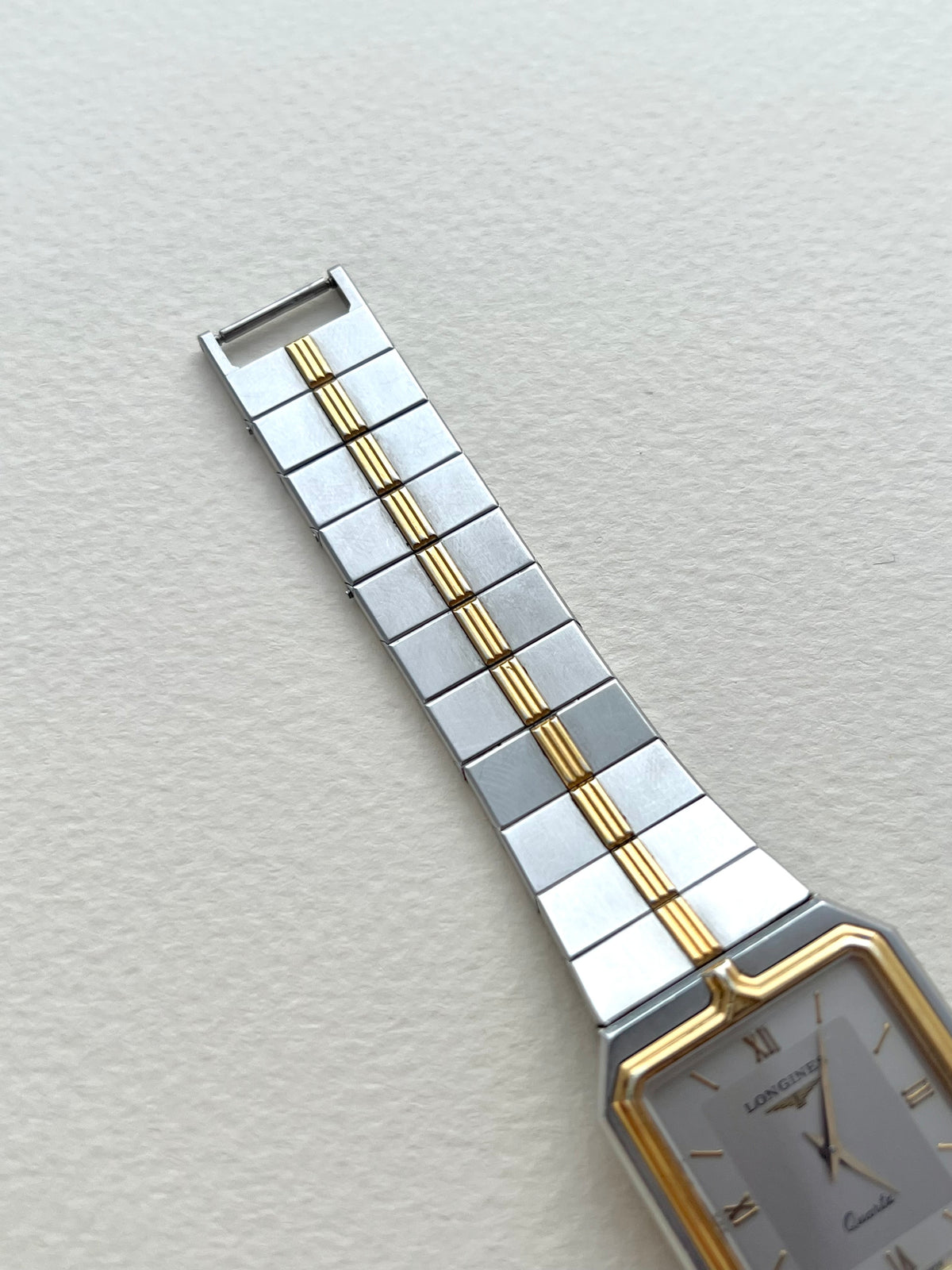 Longines Flagship two-tone rectangular watch, bracelet detail.