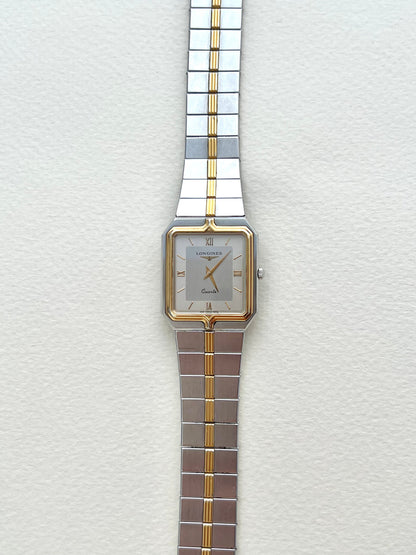 Longines Flagship two-tone rectangular watch, angle.