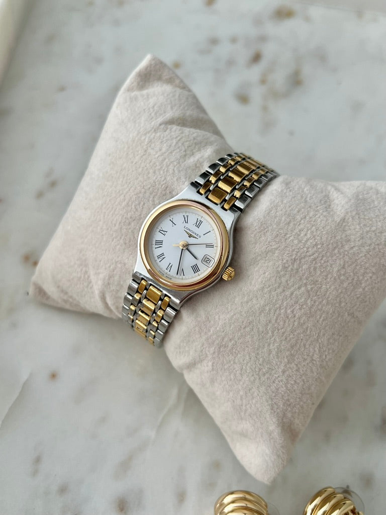 Longines Flagship two tone women’s watch with ivory Roman numeral dial, gold tone bezel and date window