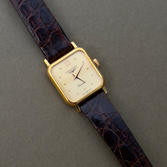 Longines Gold Toned Soft Rectangular Women's Watch, dial close up of a vintage women's watch at Gilded Hour.
