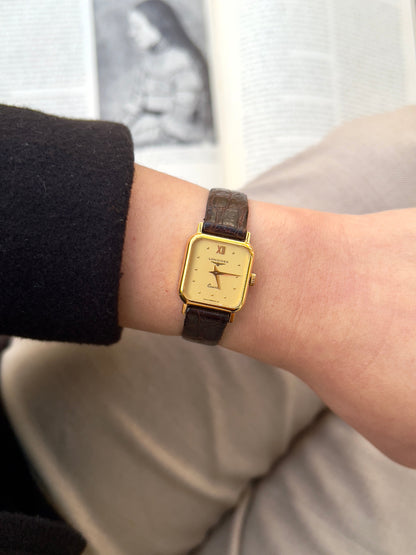 Longines Gold Toned Soft Rectangular Women's Watch, front view of a vintage women's watch at Gilded Hour.