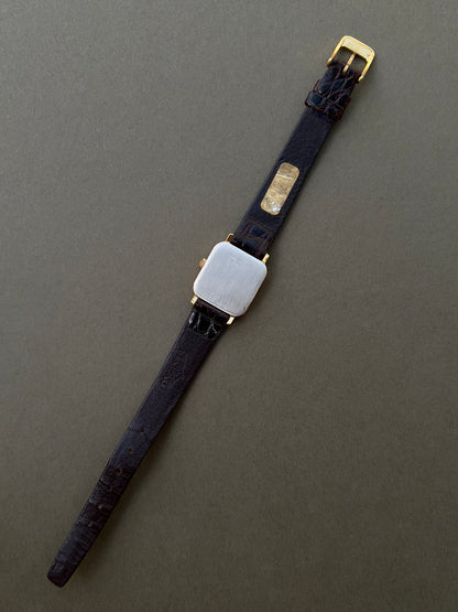 Longines Gold Toned Soft Rectangular Women's Watch, dial close up of a vintage women's watch at Gilded Hour.
