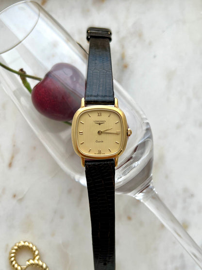 Longines Cushion Champagne Stripe Women’s Watch — Full watch and original strap laid vertically