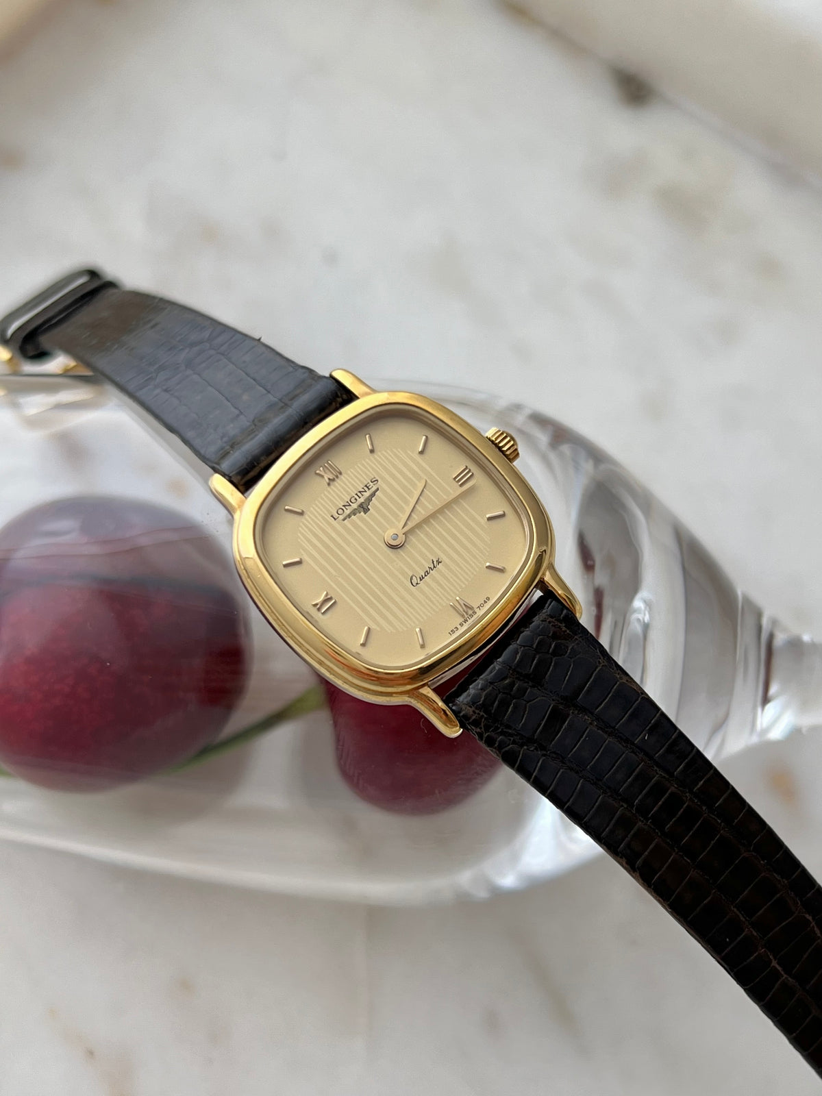 Longines Cushion Champagne Stripe Women’s Watch — Close view of the dial and applied baton markers
