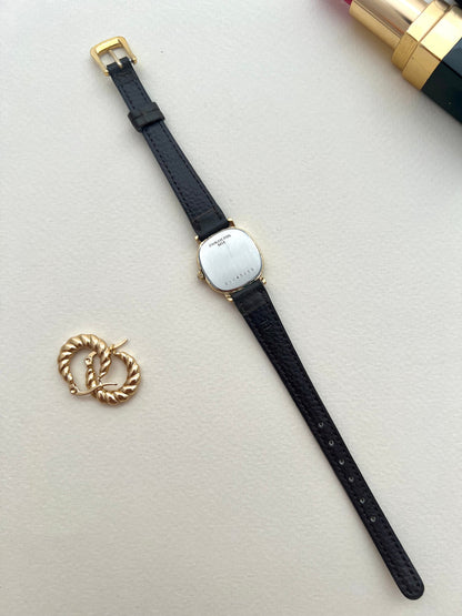 Side profile of the Longines gold cushion case and domed crown.