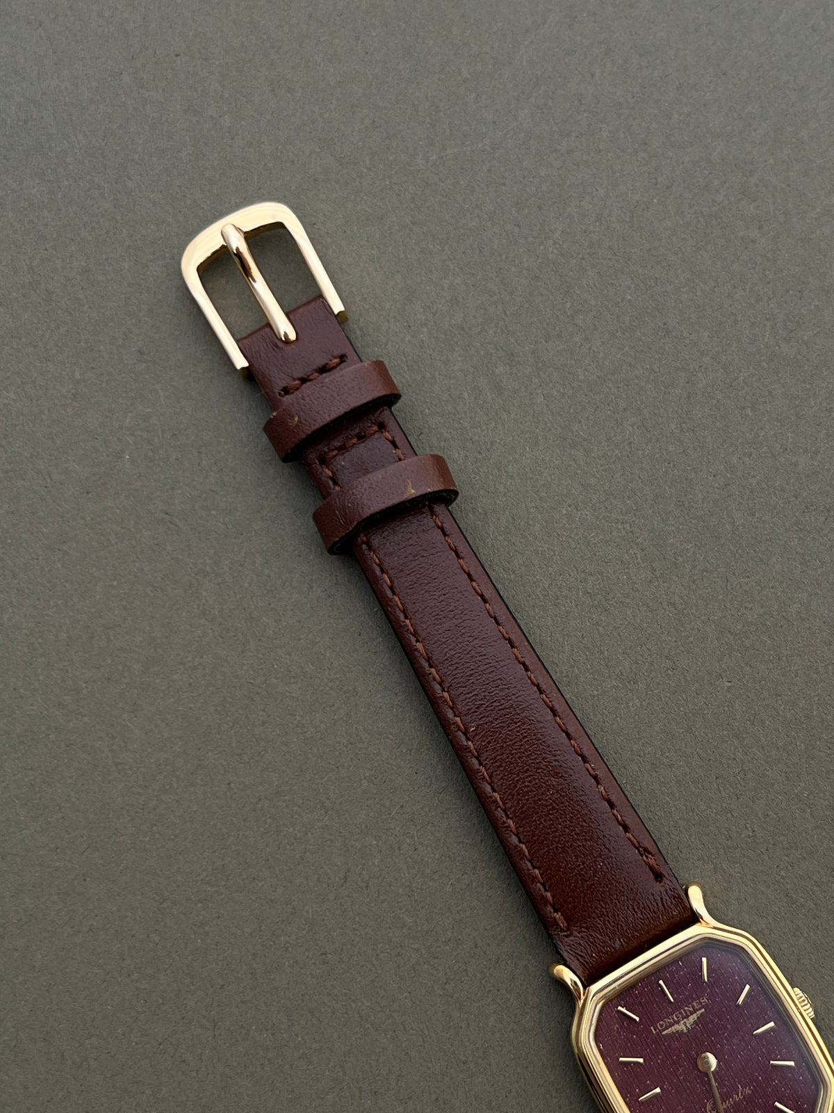 Longines Gold Wine Dial watch — strap buckle