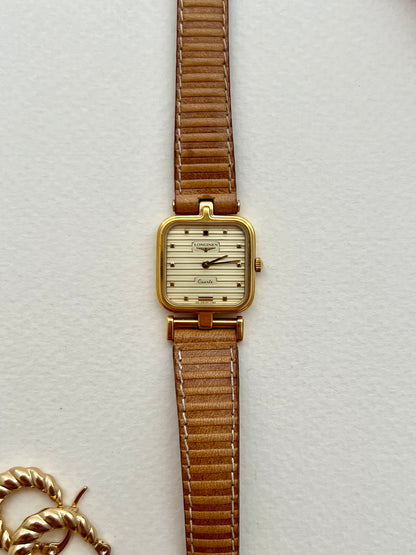 Angled view of the Longines square-cushion case and asymmetrical lugs.