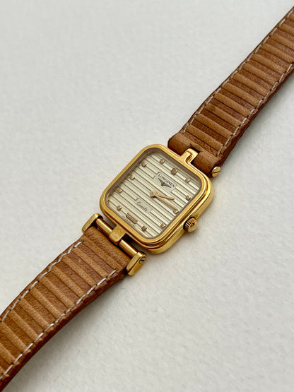 Caseback detail of the Longines square-cushion watch.
