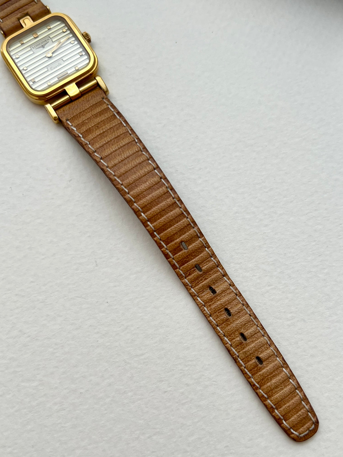 Detail of the original honey-tan Longines leather strap.