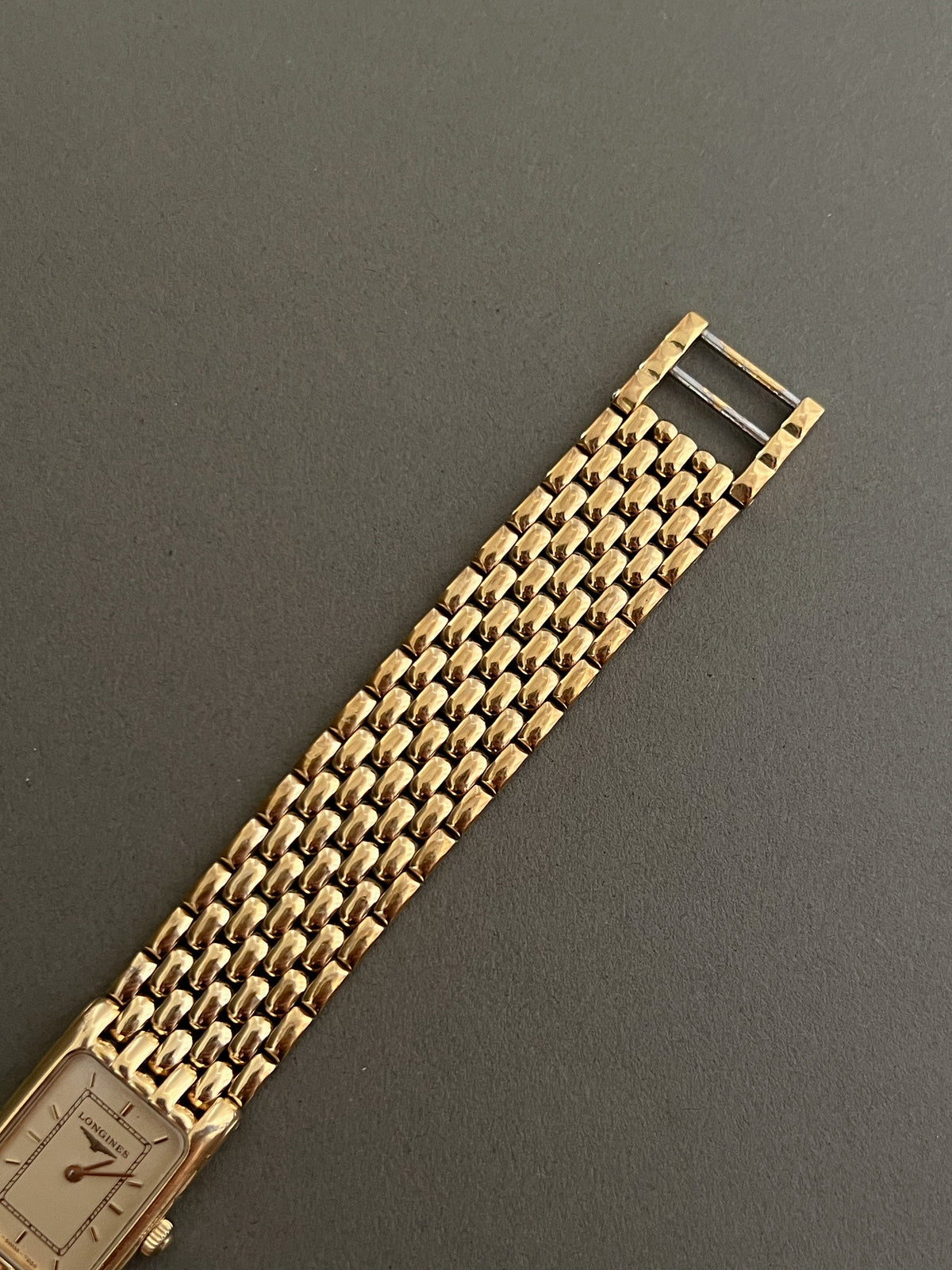 Longines Flagship Gold Tank Bracelet watch — rice link bracelet detail