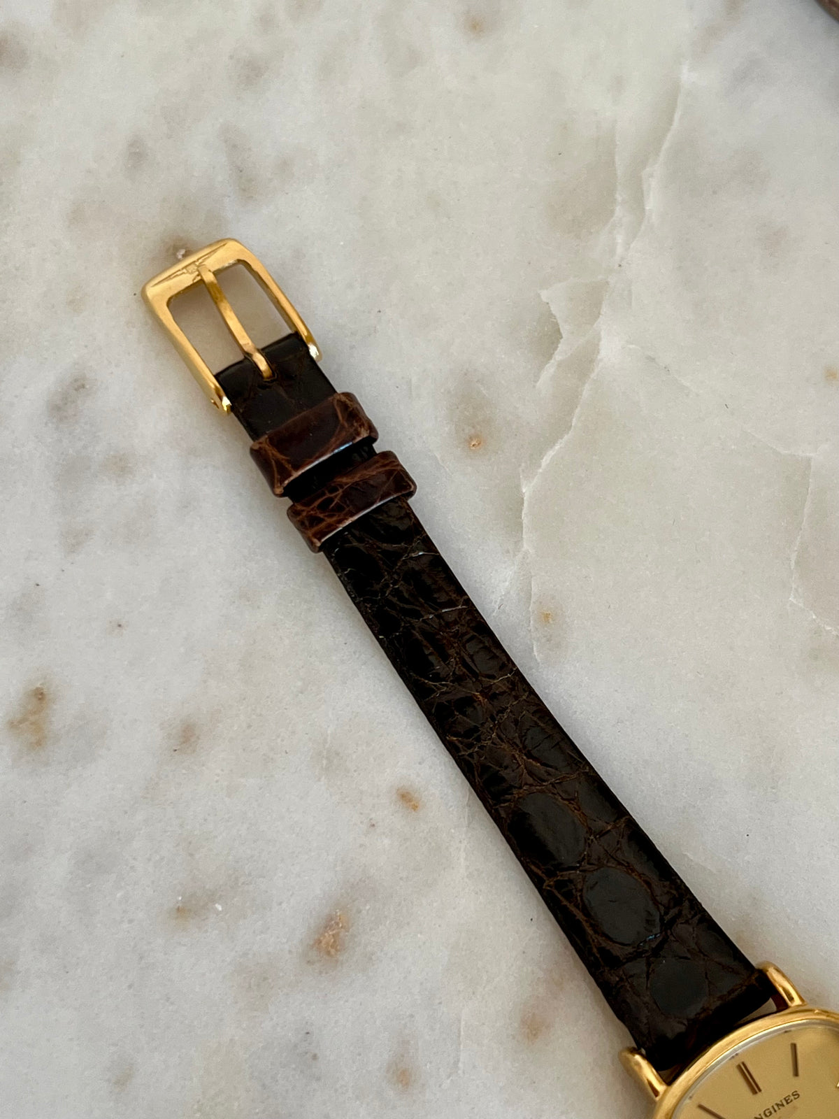 Longines Gold Round Champagne Dial watch — leather strap
