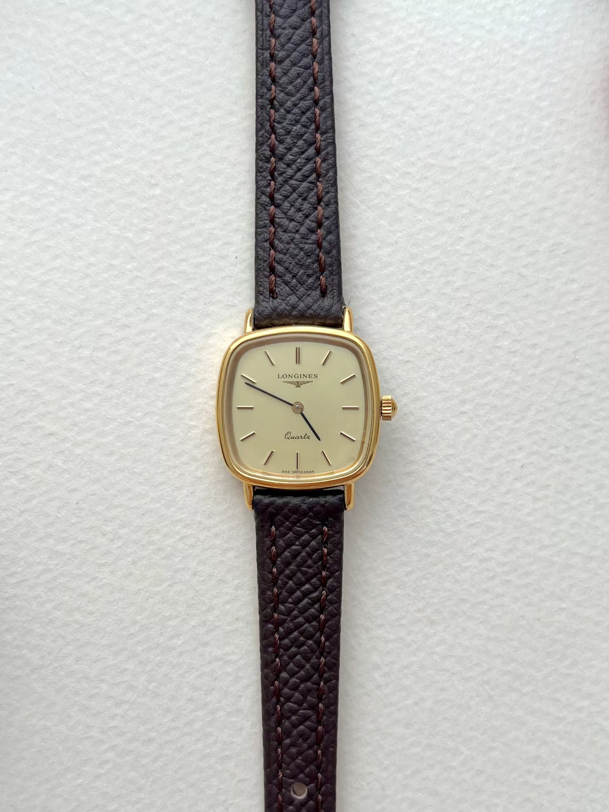 Longines Champagne Dial Gold Cushion Leather watch: full front view of the watch.