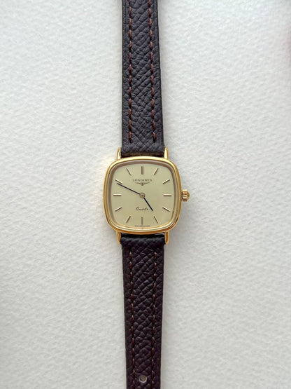 Longines Champagne Dial Gold Cushion Leather watch: full front view of the watch.