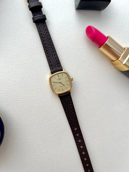 Longines Champagne Dial Gold Cushion Leather watch: strap detail.