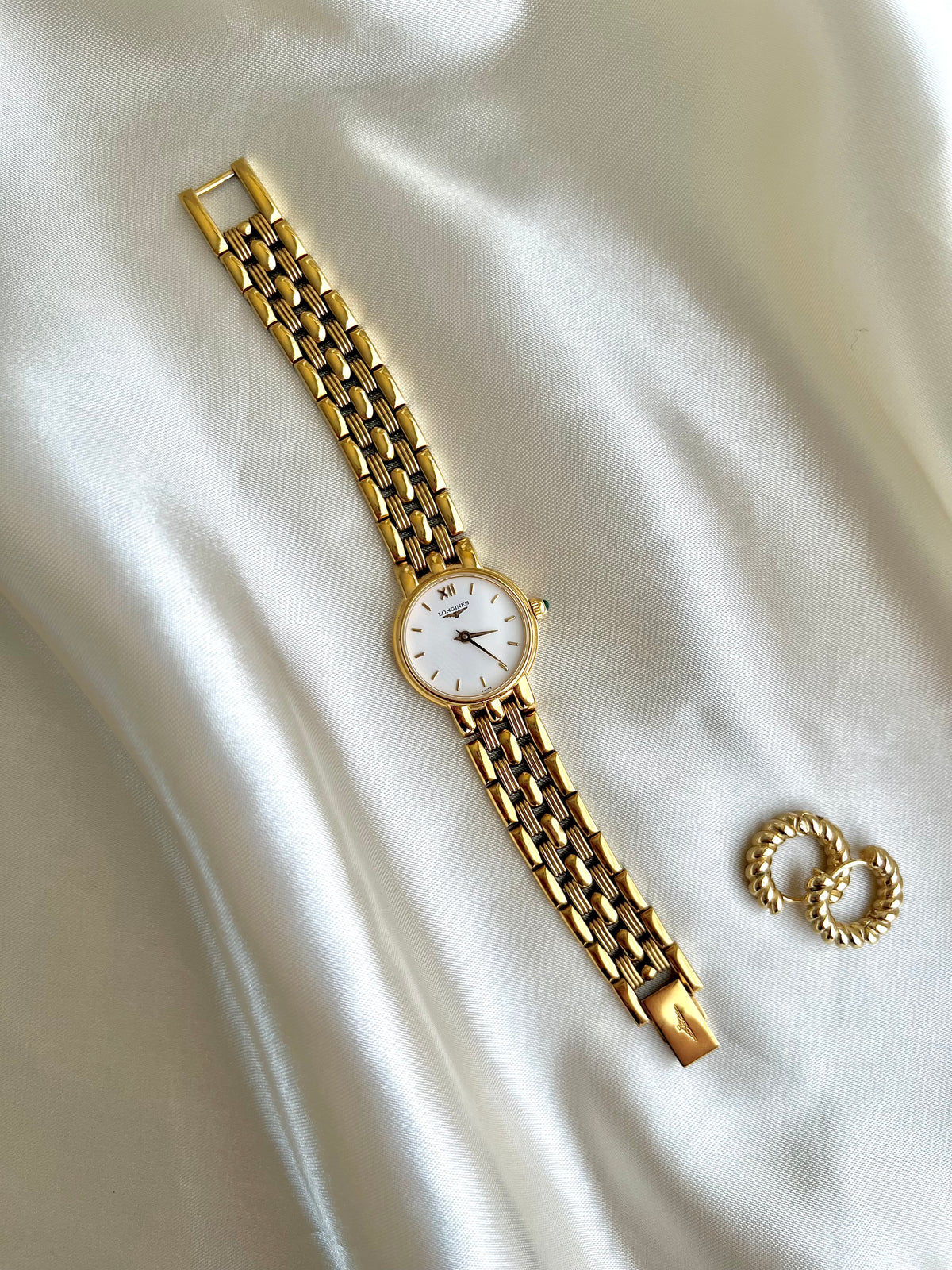 Longines Green Stone Crown Gold Bracelet watch L6.205.2: full front view of the watch.