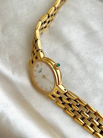Longines Green Stone Crown Gold Bracelet watch L6.205.2: side view of the case and crown.