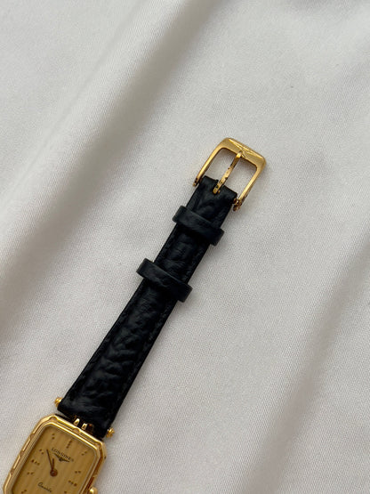 Longines Gold Toned Rectangular Womans Watch with Intricate Details, wrist shot of a vintage women's watch at Gilded Hour.