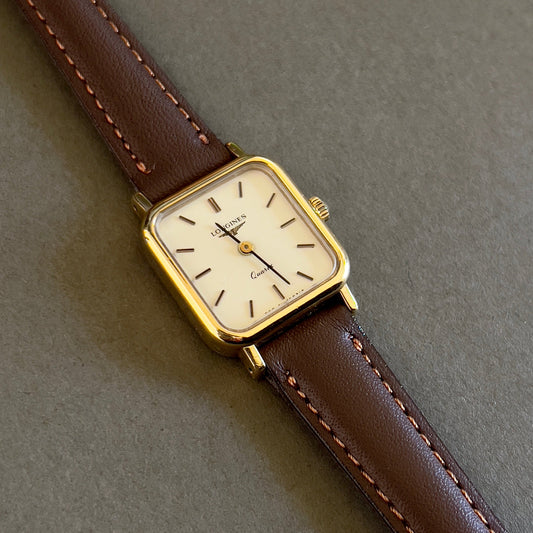 Longines Gold Toned Square Woman's Watch, case profile of a vintage women's watch at Gilded Hour.