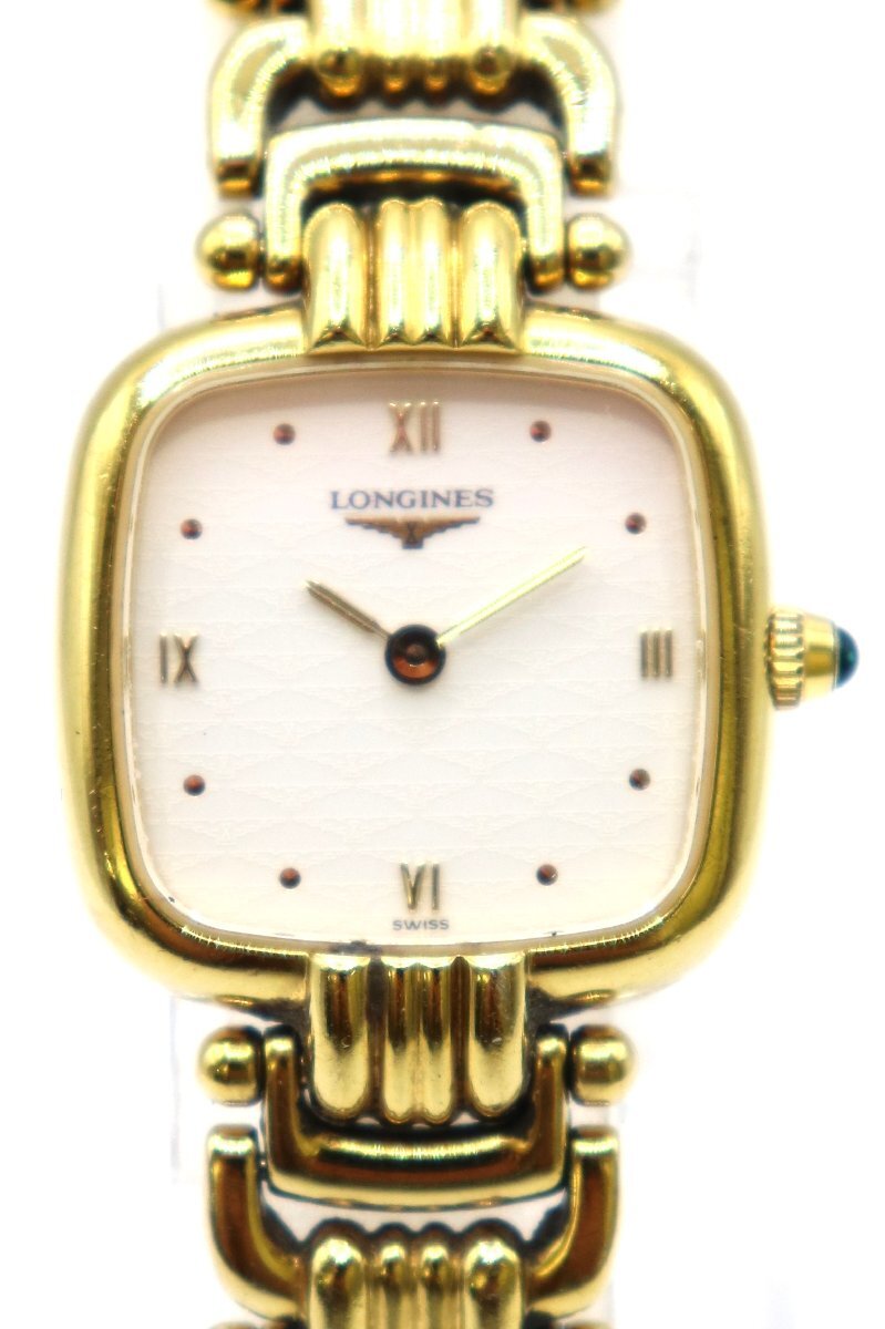 Front view of the Longines L6.201.2 gold-plated square watch with green cabochon crown and cream dial