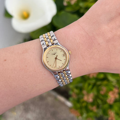 Longines Les Grandes Classiques L3.131.3 two-tone women’s watch with champagne dial and date display, front view