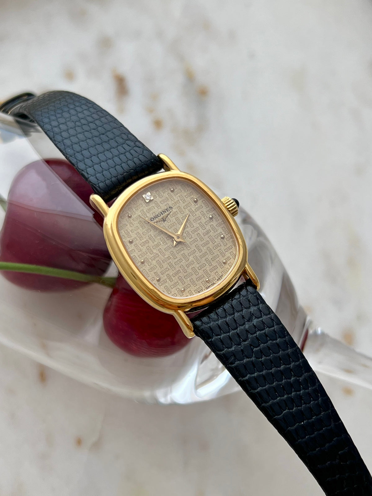 Longines Oblong Patterned Dial Women’s Watch — Close view of the textured dial and gold tone frame