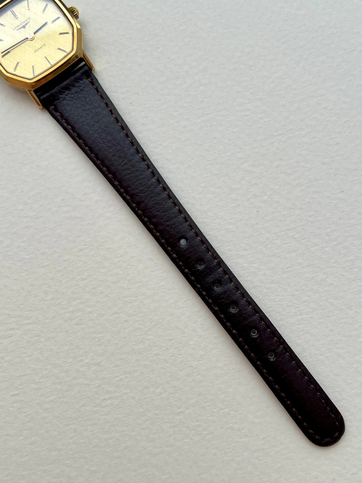 Longines Gold Octagonal Woven Dial watch — strap