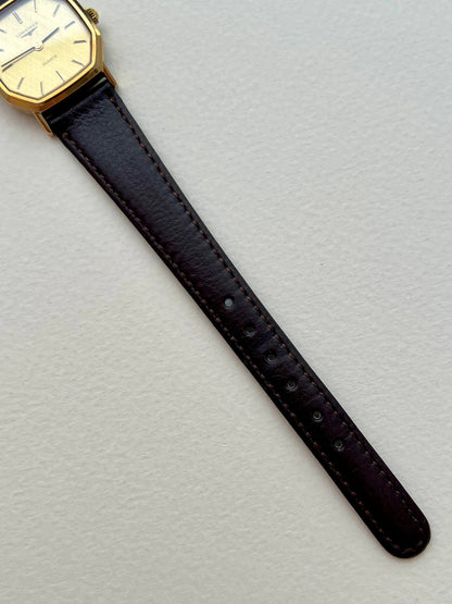 Longines Gold Octagonal Woven Dial watch — strap
