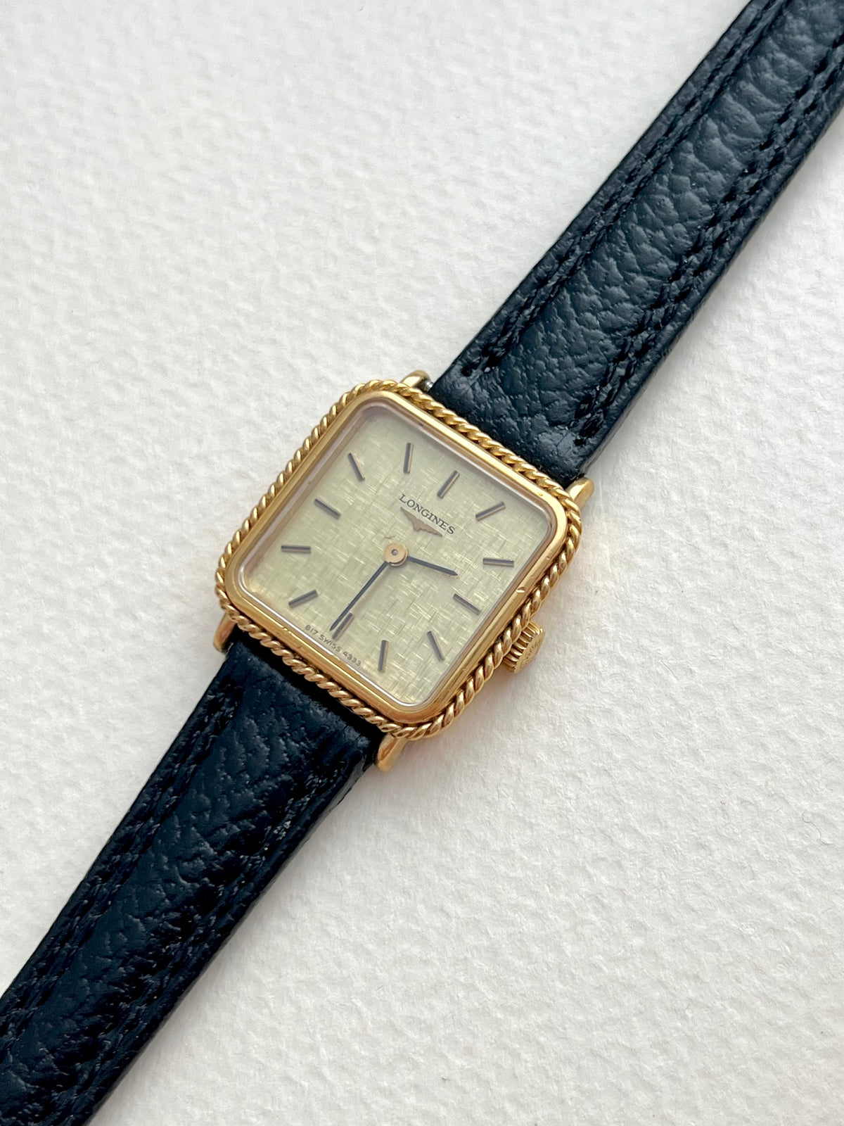 Longines Rope Bezel Linen Dial Leather watch 4333.817: angled view of the dial and case.