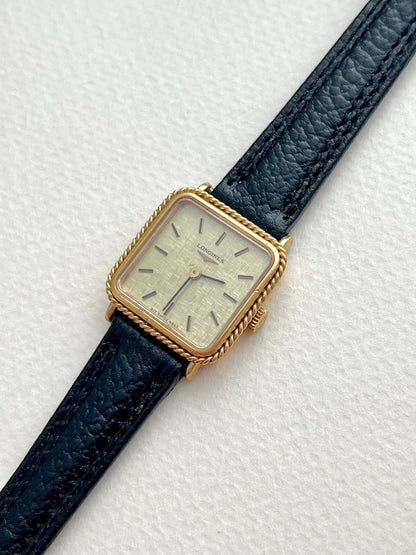 Longines Rope Bezel Linen Dial Leather watch 4333.817: angled view of the dial and case.