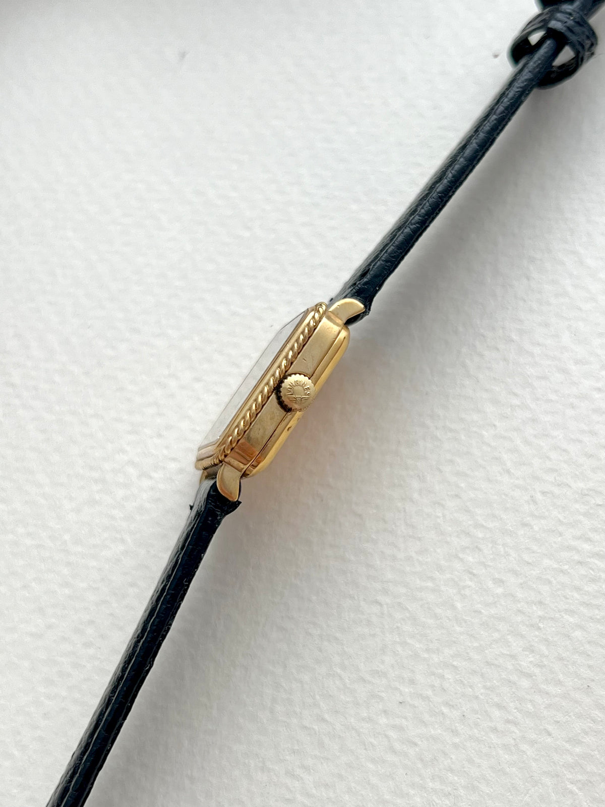 Longines Rope Bezel Linen Dial Leather watch 4333.817: side view of the case and crown.