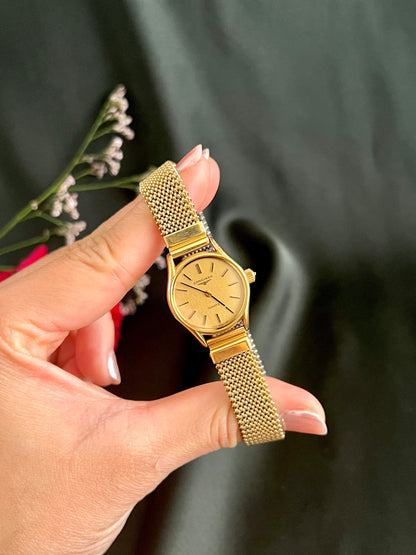Longines Champagne Bracelet Women’s Watch — dial and gold bracelet close view