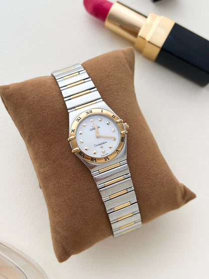 Caseback view of the Omega Constellation Manhattan with its embossed emblem.