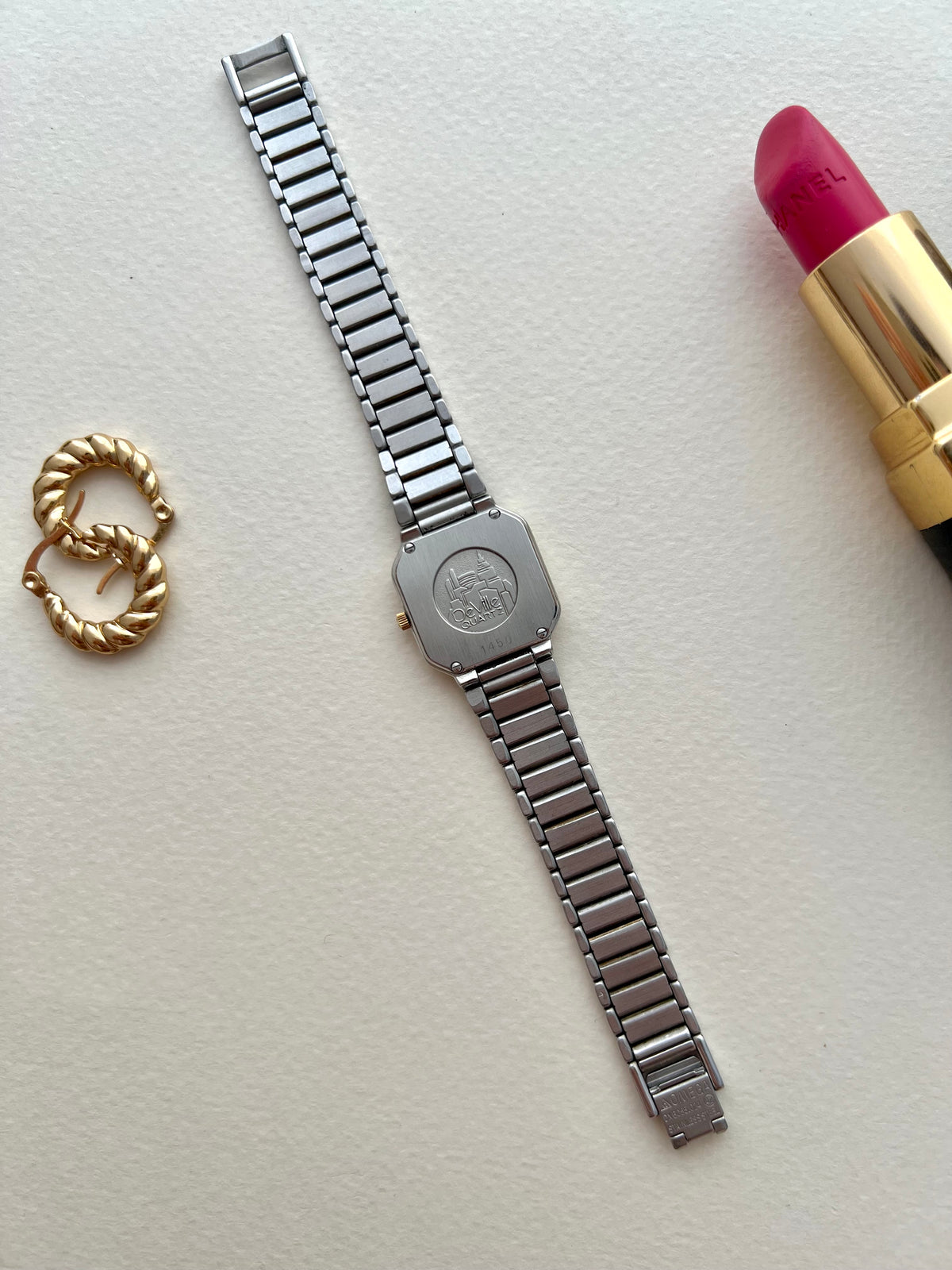 Omega De Ville America ladies watch shown with its presentation box.