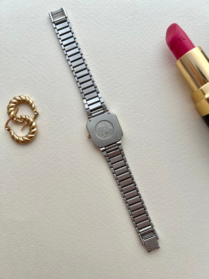 Omega De Ville America ladies watch shown with its presentation box.