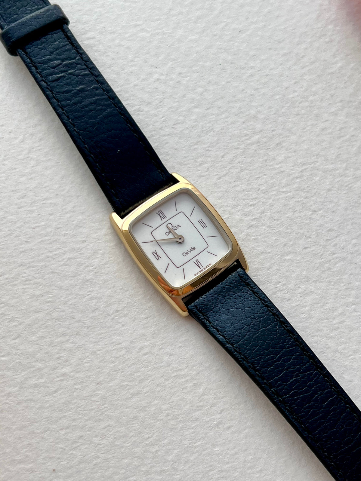 Caseback detail of the Omega De Ville watch.