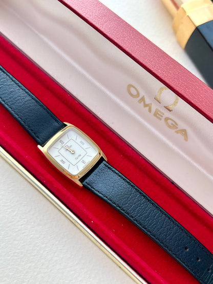 Omega De Ville watch and original red presentation box.